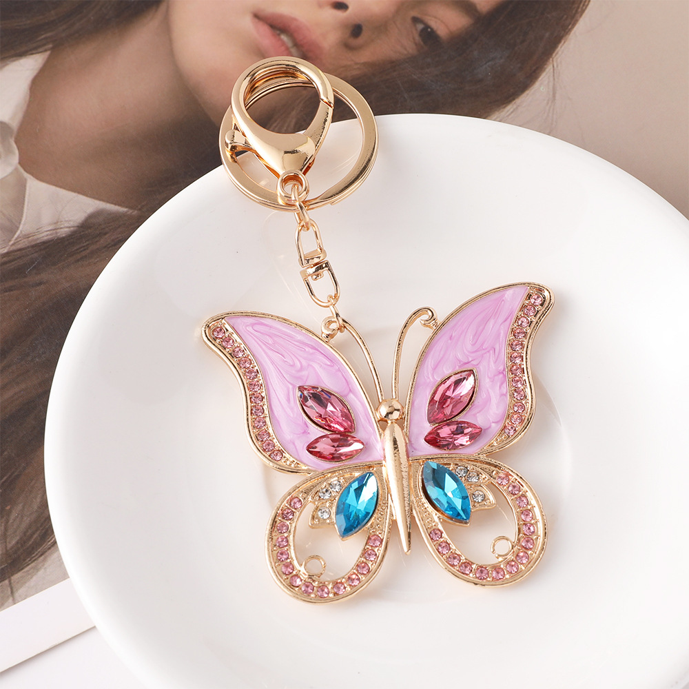 Porte-clés de luxe papillon ro - Luxury Bags Wholesale avis et prix